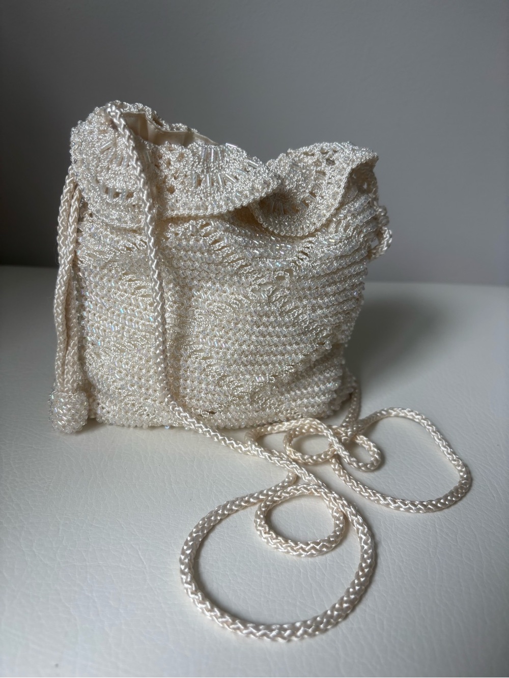 Elegant Ivory Beaded Drawstring Crossbody Bag